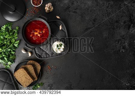 Traditional Ukrainian Russian Borscht On A Dark Background. Borscht With Sour Cream. Beetroot Borsch
