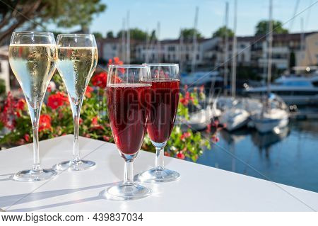 Summer Party With Kir Royal Cocktail, Tasting Of French Brut Champagne Sparkling Wine And Cold Creme