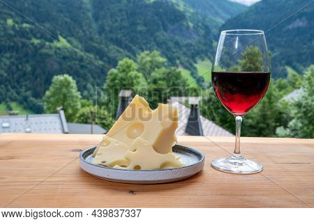 Cheese Collection, French Cow Cheese Emmental, Glass Of Red Wine From Savoie And French Mountains Vi