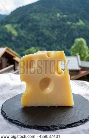 Cheese Collection, French Cow Cheese Emmental And French Mountains Village In Haute-savoie On Backgr