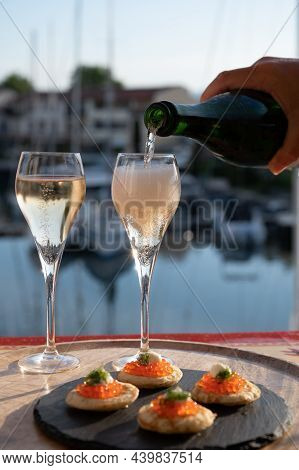 Russian Style Party With Two Glasses Of White Cold Champagne, Bliny With Red Caviar And View On Port