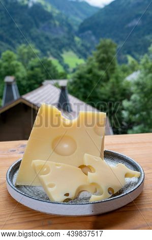 Cheese Collection, French Cow Cheese Emmental And French Mountains Village In Haute-savoie On Backgr