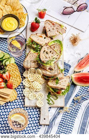 Picnic wholewheat sandwiches on a cutting board