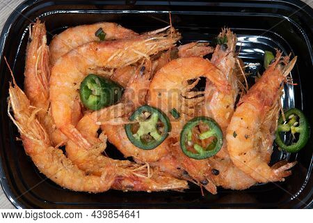 Jalapeno Peppers Chopped Over The Pepper Seasoned Shrimp With Heads Still On For A Delicious Seafood