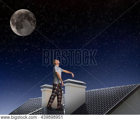 Sleepwalker Wearing Pajamas On Roof In Night