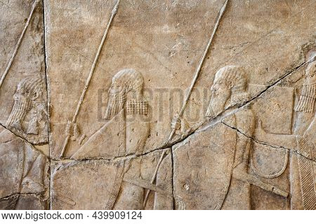 Ancient Assyrian Stone Wall Relief With Guards Figures