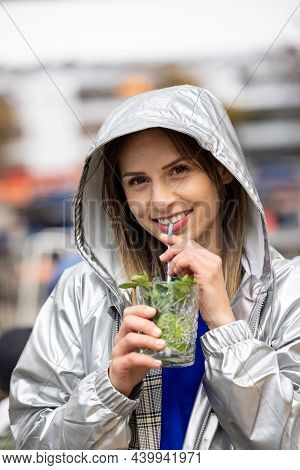 Attractive Young Woman Or Twentysomething Girl Drinking Mojito With Straw In City Center During Happ