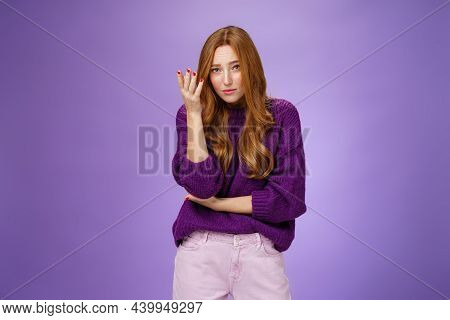 Jeez What You Saying. Portrait Of Redhead 20s Female Student Making Facepalm Gesture Raising Eyebrow