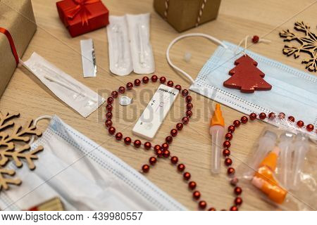 Christmas Decoration And Covid Test With Mask On Table