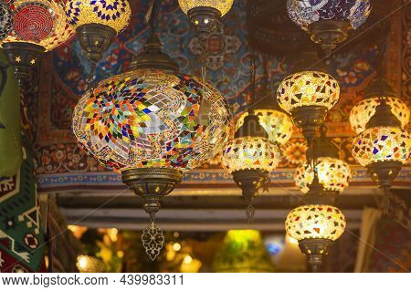 Middle Eastern Lambas Of Different Colors And Sizes Are Hanging In The Bazaar. Bright Traditional Ar