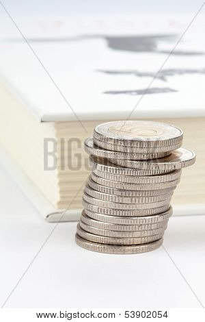Coins and white book