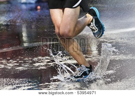 Marathon Runner Crossing Puddle