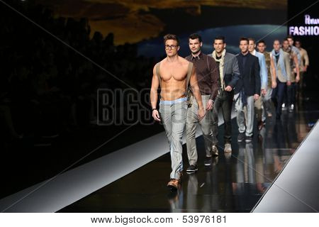 ZAGREB, CROATIA - OCTOBER 19: Fashion model wearing clothes designed by Ivica Klaric on the 'Fashion.hr' show on October 19, 2013 in Zagreb, Croatia.