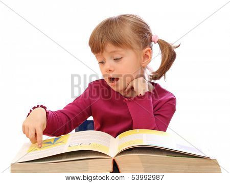 Little girl reading a book