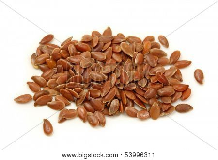 Brown flax seeds isolated on white background