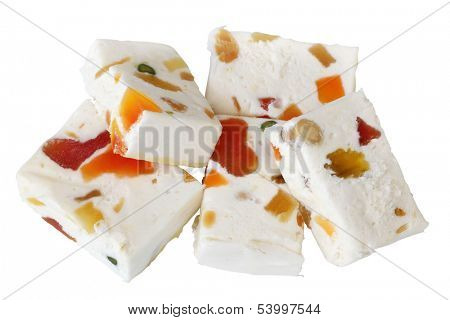 Nougat with dried fruits isolated on white background