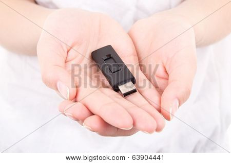 Young Woman Hands Holding Flash Drive