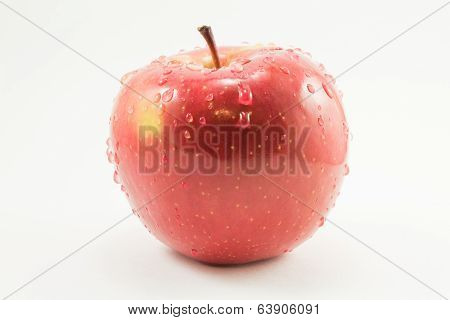 red apple with drops