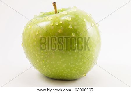 green apple with drops
