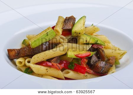 Pasta with shrimps, herbs and mashrooms isolated on white background in studio