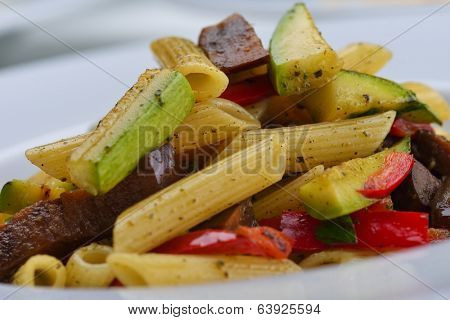 Pasta with shrimps, herbs and mashrooms isolated on white background in studio