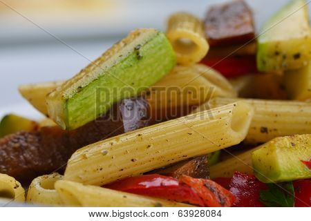 Pasta with shrimps, herbs and mashrooms isolated on white background in studio