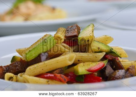 Pasta with shrimps, herbs and mashrooms isolated on white background in studio