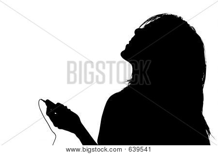 Silueta con Clipping Path de mujer escuchando música