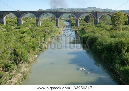 abandoned railway bridge on Simeto River, Sicily