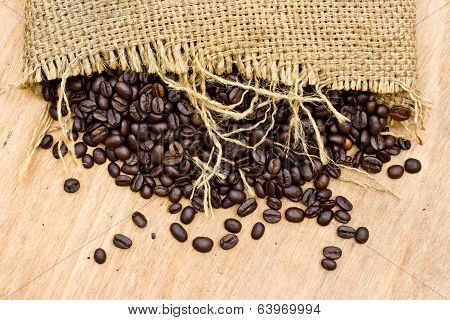 Fresh Coffee Beans On Wood Background