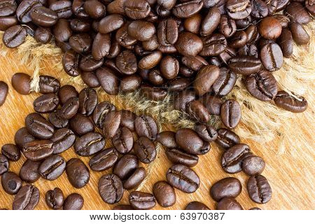 Fresh Coffee Beans On Wood Background