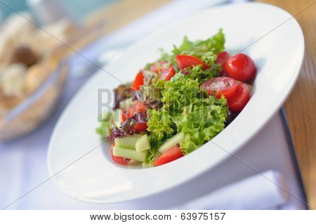 happy young couple having lanch at beautiful restaurant on by the sea on  beach