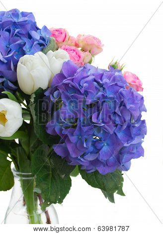 white tulips, pink roses and blue hortensia flowers
