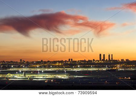 Madrid at sunset with city lights