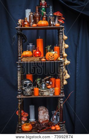 Old Shelves With Items To Celebrate Halloween
