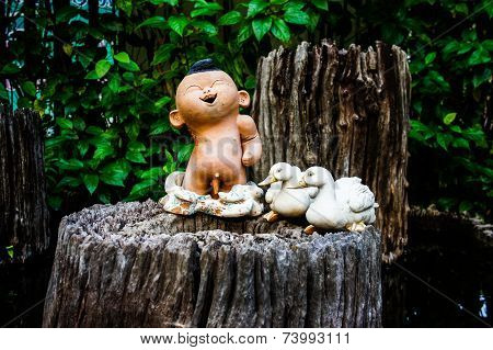 Ceramic dolls in the garden