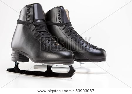 Figure Skating Concept: Professional Mens Figure Skates Isolated Over White Background