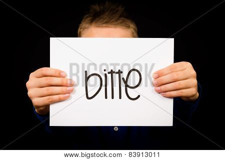 Child Holding Sign With German Word Bitte - Please