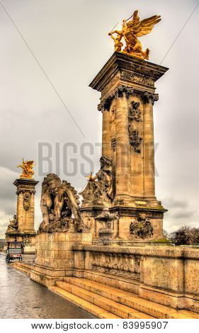 Sculptures At The Entrance To The Pont Alexandre Iii In Paris