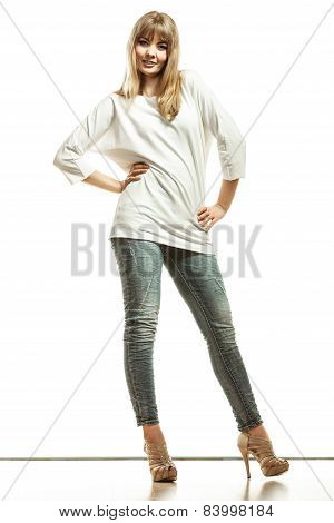 Blonde Fashion Woman In White Shirt Denim Pants