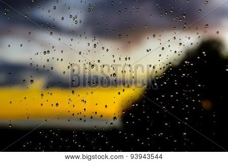 Rain drops on glass panel
