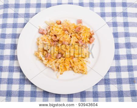 Ham And Cheese Hashbrowns On White Plate