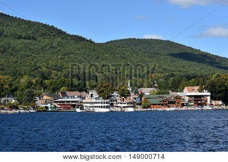 LAKE GEORGE, NY - SEP 24: View of Lake George from the Village, in New York State, as seen on Sep 24, 2016. The lake lies within the upper region of the Great Appalachian Valley and drains all the way northward into Lake Champlain and the St. Lawrence Riv