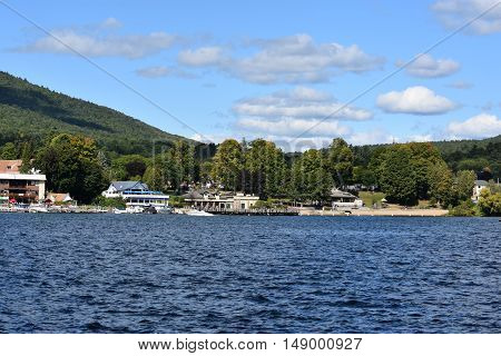 LAKE GEORGE, NY - SEP 24: View of Lake George from the Village, in New York State, as seen on Sep 24, 2016. The lake lies within the upper region of the Great Appalachian Valley and drains all the way northward into Lake Champlain and the St. Lawrence Riv