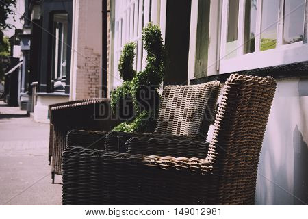 BEACONSFIELD ENGLAND - JUNE 2016: Chairs for sale outside a shop in the old town Vintage Retro Filter.