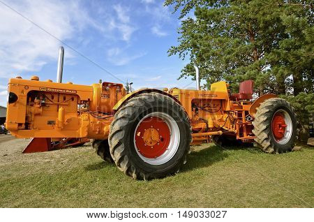 ROLLAG, MINNESOTA, Sept 1, 2016: Minneapolis Moline restored G and GB tractors are combined into one and displayed at the West Central Steam Threshers in Rollag, Minnesota where 1000's attend annually each Labor Day weekend.