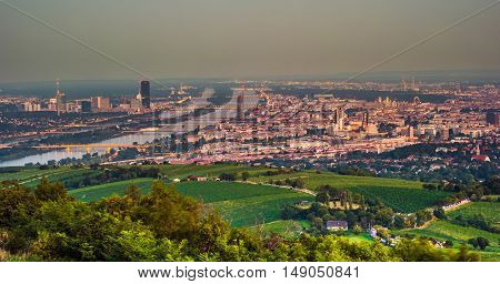 Beautiful view of skyline of Vienna and Danube River with green trees of Doebling district, Austria. Travel photo of the landmark.