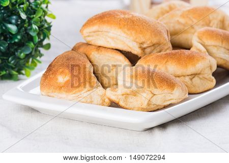 hot pandesal for breakfast, famous bread in the Philippines