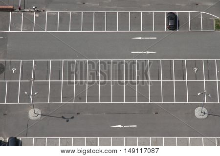 A photo of a Parking space from above.
