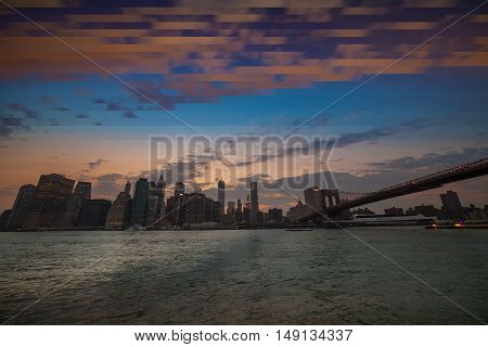 Downtown Manhattan skyline at dusk, New York City - NY - USA. TimeSlise shooting technique.